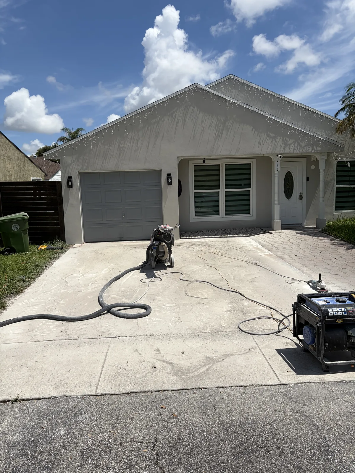 Grinding the driveway before coating