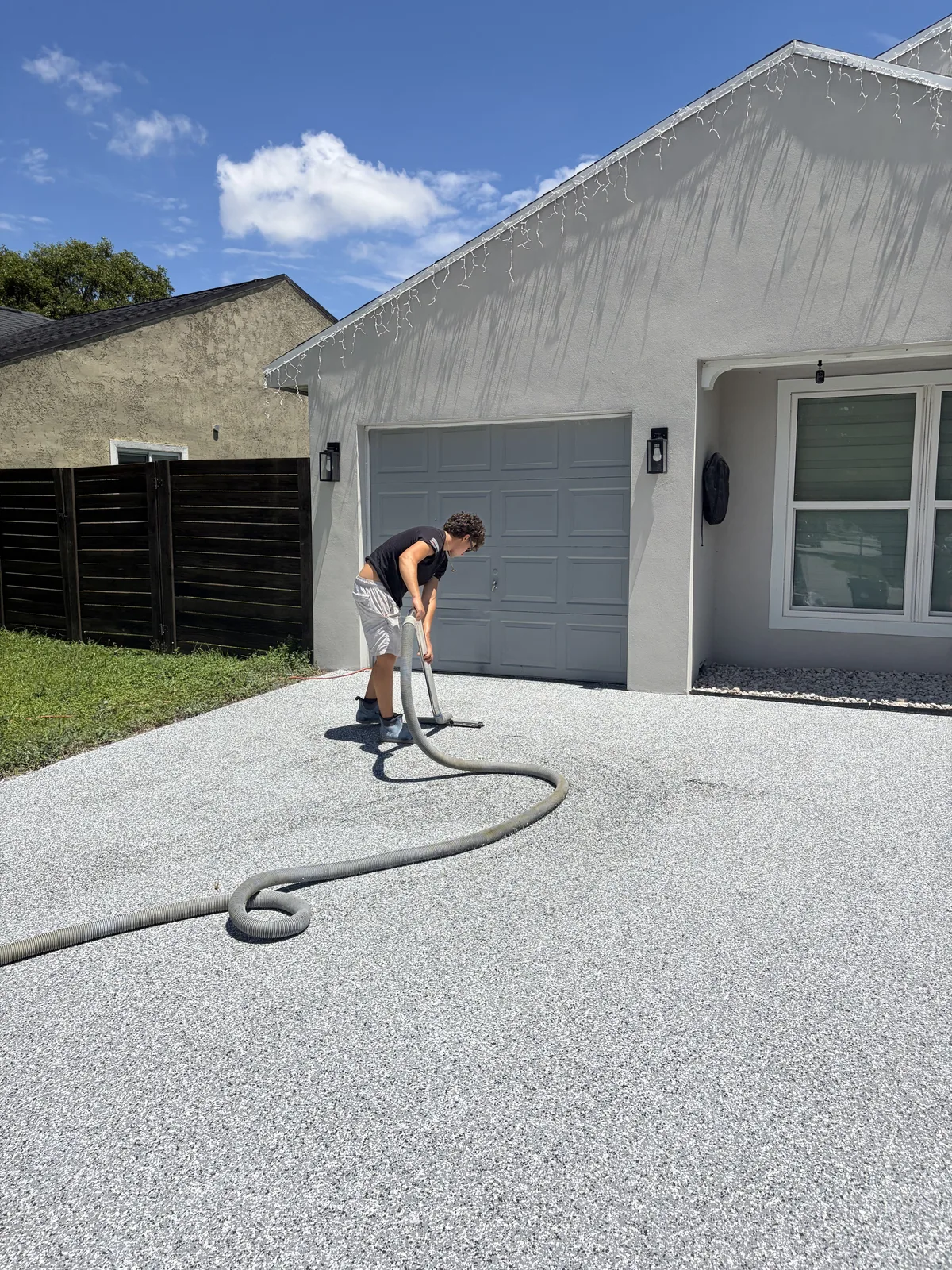 Vacuuming concrete dust during prep